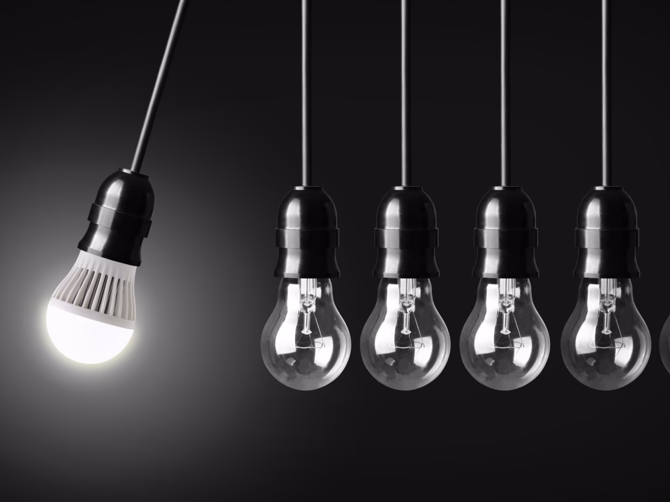 A row of bulbs with one lit